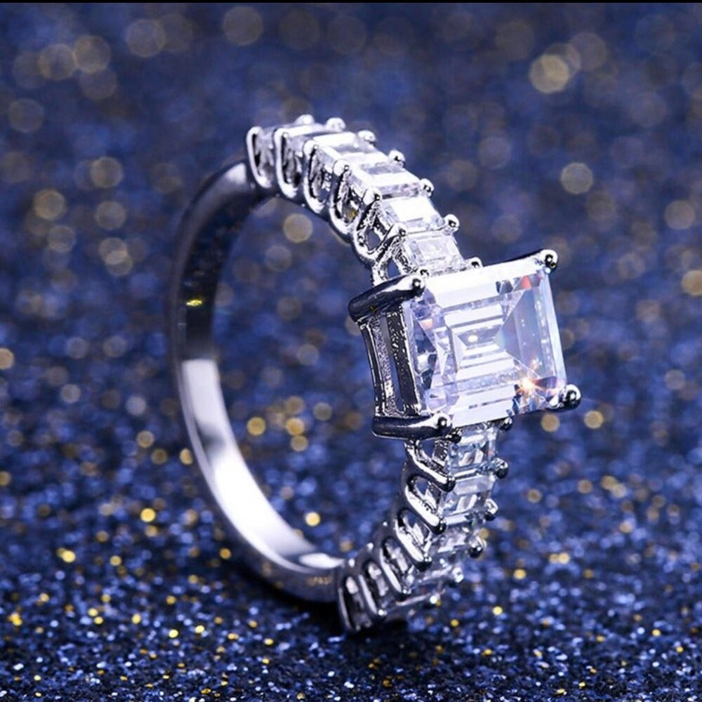 Women's Zirconia Ring with an Emerald Cut Featuring Baguette Side Accents